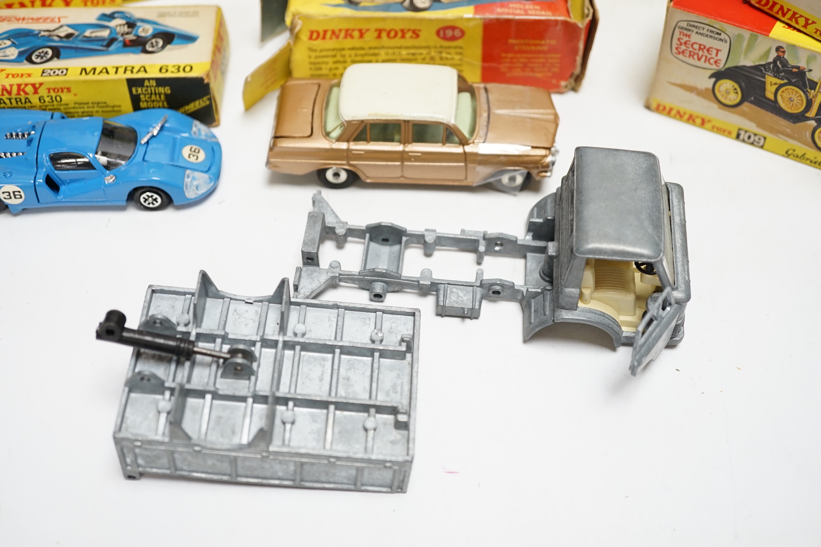 Eight boxed Dinky Toys including two (109) Gabriel Model T Fords, (987) ABC TV Mobile Control Room, (200) Matra 630, (116) Volvo 1800S, (216) Ferrari Dino, (196) Holden Special Sedan, (451) Johnston Road Sweeper, plus an